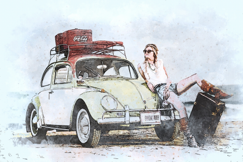 VW-Käfer mit Frau bereit zur Urlaubsreise